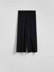 Spodnie culotte - czarny. Czarne spodnie materiałowe damskie Reserved, bez wzorów, z dzianiny. Za 69.99 zł.