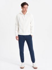 Spodnie męskie dresowe CARROT ze strukturalnej dzianiny - ciemnoniebieskie V5 - Rozmiar: XXL. Niebieskie spodnie dresowe męskie Ombre Clothing, bez wzorów, z bawełny. W wyprzedaży za 59.99 zł.