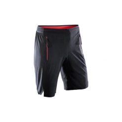 Spodenki fitness kardio FST 900 męskie. Niebieskie szorty męskie DOMYOS, bez wzorów, z elastanu. W wyprzedaży za 64.99 zł.