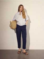 Lniana koszula - jasnoniebieski. Niebieskie koszule damskie Reserved, l, bez wzorów, bez kołnierzyka, bez ramiączek. Za 129.99 zł.