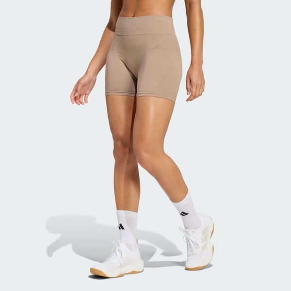 Legginsy Workout Essentials 4 inch. Brązowe legginsy damskie Adidas, bez wzorów, na fitness i siłownię, climacool (adidas). Za 129.00 zł.