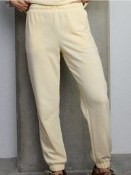 Spodnie jogger z dzianiny terry - żółty. Żółte spodnie materiałowe damskie Sinsay, bez wzorów, z dzianiny. Za 29.99 zł.