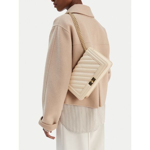 Torebka Badura. Brązowe listonoszki damskie Badura, bez wzorów, bez dodatków. Za 199.99 zł.