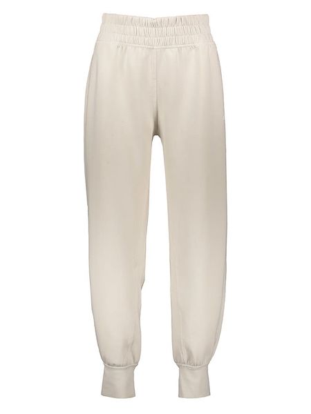 Adidas Spodnie sportowe "STU" w kolorze beżowym rozmiar: L. Brązowe spodnie dresowe damskie Adidas, l, outdoorowe. Za 191.42 zł.