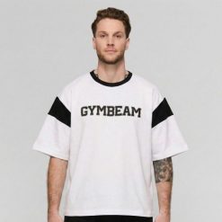 Koszulka męska fitness oversize Premium Heavyweight Varsity. Czarne t-shirty sportowe męskie GYMBEAM, m, bez ramiączek, na fitness i siłownię. Za 114.90 zł.