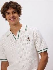 Ażurowy sweter polo - złamana biel. Swetry męskie Reserved, l, w ażurowe wzory, z bawełny, bez kołnierzyka. Za 139.99 zł.