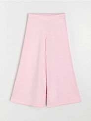 Spodnie culotte z miękkiej dzianiny z dodatkiem wiskozy - różowy. Czerwone spodnie materiałowe damskie Sinsay, bez wzorów, z dzianiny. Za 39.99 zł.