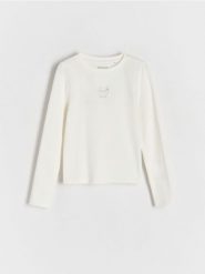 Koszulka z aplikacją - złamana biel. Koszulki dziewczęce Reserved, z aplikacjami, z bawełny, bez ramiączek. W wyprzedaży za 15.99 zł.