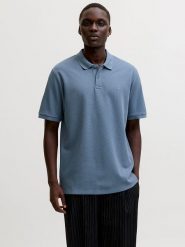 Jack & Jones Koszulka polo "Austin" w kolorze niebieskim rozmiar: M. Niebieskie koszulki polo męskie Jack & Jones, m, bez wzorów, bez ramiączek. Za 105.14 zł.
