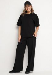 Czarny Bawełniany Komplet Szerokie Spodnie i T-shirt z Rozcięciami Norpio. Czarne spodnie materiałowe damskie Born2be, bez wzorów, z bawełny, eleganckie. Za 139.99 zł.