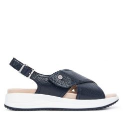 Sandały Caprice. Niebieskie sandały damskie Caprice, bez wzorów, bez obcasa, na płaskiej podeszwie. Za 399.99 zł.