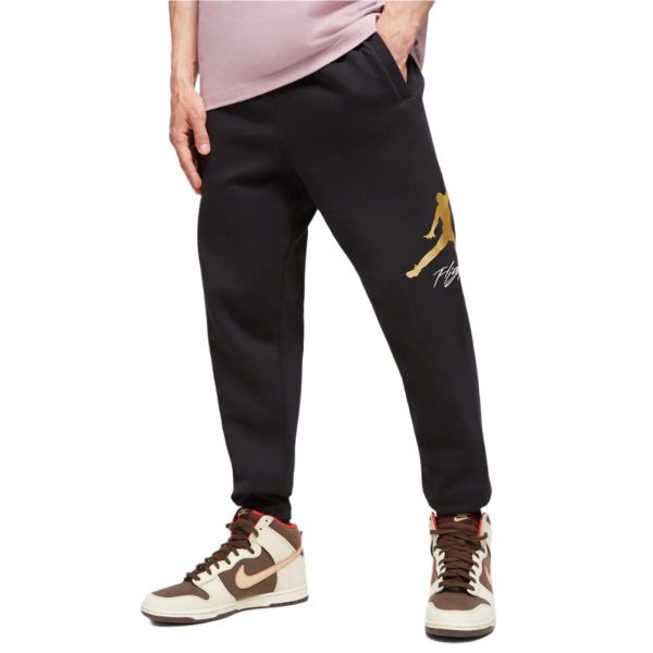 Spodnie Jordan Ess. Fioletowe spodnie materiałowe męskie Jordan, bez wzorów, z polaru. Za 335.99 zł.