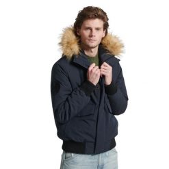 Kurtka z kapturem Superdry Everest. Niebieskie kurtki męskie Superdry., m, bez wzorów, z puchu, z kapturem. W wyprzedaży za 704.00 zł.