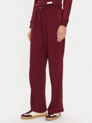 Tommy Hilfiger Spodnie dresowe UW0UW04771 Bordowy Relaxed Fit. Czerwone spodnie dresowe damskie Tommy Hilfiger, xl, bez wzorów, z dresówki. Za 259.99 zł.