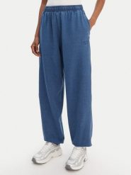 Reebok Spodnie dresowe Tenley RK25488CCW Niebieski Regular Fit. Niebieskie spodnie dresowe damskie Reebok, s, bez wzorów, z bawełny. Za 299.99 zł.