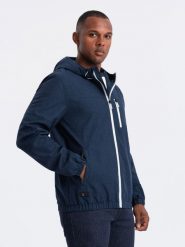 Lekka sportowa kurtka męska z polarową podszewką – granatowa V2 OM-JANP-0136 - XXL. Niebieskie kurtki treningowe męskie Ombre Clothing, l, z aplikacjami, z gumy, żeglarskie. W wyprzedaży za 189.99 zł.