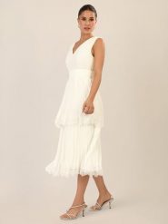 APART Sukienka w kolorze kremowym rozmiar: 42. Brązowe sukienki damskie Apart, bez wzorów, bez kołnierzyka, bez ramiączek, midi. Za 391.99 zł.