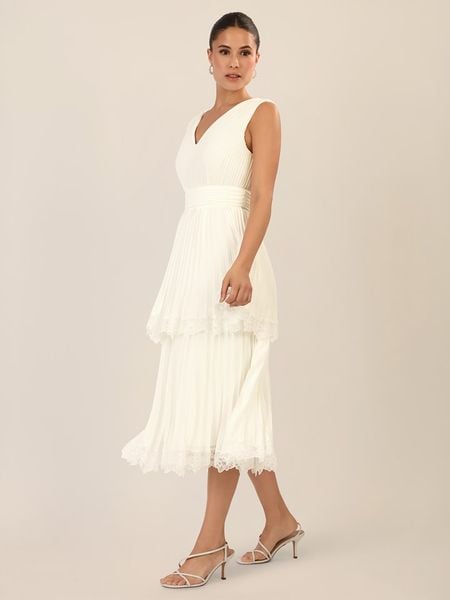 APART Sukienka w kolorze kremowym rozmiar: 42. Brązowe sukienki damskie Apart, bez wzorów, bez kołnierzyka, bez ramiączek, midi. Za 391.99 zł.