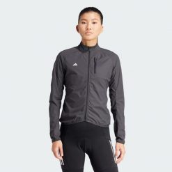 Kurtka do jazdy na rowerze WIND.RDY. Czarne kurtki damskie Adidas, bez wzorów, z materiału, bez kaptura. Za 479.00 zł.