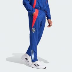 Spodnie Spain Tiro 24 Competition Presentation. Czerwone spodnie dresowe męskie Adidas, bez wzorów, z dresówki. W wyprzedaży za 203.50 zł.