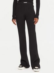 Guess Legginsy V5BB08 Z3JD2 Czarny Flare Fit. Czarne legginsy sportowe damskie Guess, xl, z aplikacjami, z syntetyku. Za 299.99 zł.