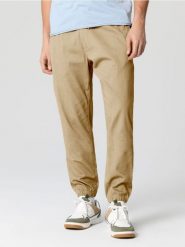 Spodnie jogger - beżowy. Brązowe spodnie materiałowe męskie Sinsay, bez wzorów. Za 49.99 zł.