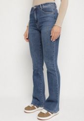 Niebieskie Elastyczne Jeansy o Kroju Dzwonów Zenaia. Niebieskie jeansy damskie Born2be, z podwyższonym stanem. Za 119.99 zł.