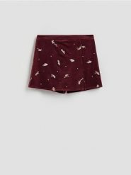 Spódnico-szorty z cekinami - burgundowy. Czerwone szorty damskie Reserved, bez wzorów, z weluru. W wyprzedaży za 99.99 zł.