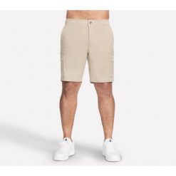 Spodenki Męskie Skechers. Brązowe szorty męskie Skechers, bez kołnierzyka. Za 175.99 zł.