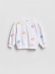 Bluza z kwiatami - biały. Białe bluzy i bluzki niemowlęce Reserved, bez wzorów, z bawełny, bez ramiączek, bez kaptura. Za 49.99 zł.