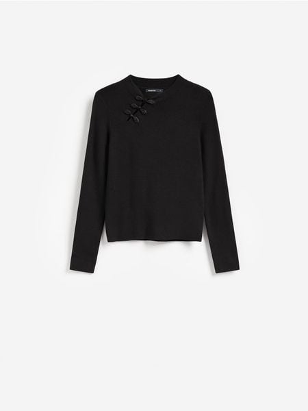Sweter z ozdobnym detalem - czarny. Czarne swetry klasyczne damskie Reserved, l, z dzianiny, bez kołnierzyka. Za 119.99 zł.
