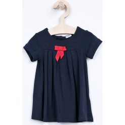 Blukids - Sukienka dziecięca 68-98 cm. Niebieskie sukienki dziewczęce Blukids, bez wzorów, z dzianiny, casualowe, bez ramiączek, krótkie. W wyprzedaży za 17.90 zł.