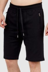 DOLCE & GABBANA Czarne szorty męskie z bawełny. Czarne szorty męskie Dolce and Gabbana, z bawełny, bez kołnierzyka. W wyprzedaży za 1,499.99 zł.