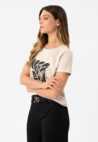 Koszulka z graficznym nadrukiem T-MYKONOS. Białe t-shirty damskie Volcano, m, bez wzorów, z bawełny, bez ramiączek. Za 84.99 zł.