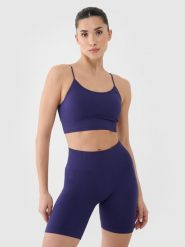 4F Biustonosz treningowy bezszwowy z niskim wsparciem damski - granatowy M/L. Niebieskie biustonosze sportowe damskie 4f, bez wzorów, z dzianiny. W wyprzedaży za 79.99 zł.