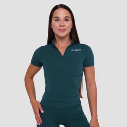 Koszulka damska fitness z zamkiem ciemnozielona Ignite Cropped. Zielone bluzki sportowe damskie GYMBEAM, s, z dresówki, bez kołnierzyka, bez ramiączek. Za 109.90 zł.