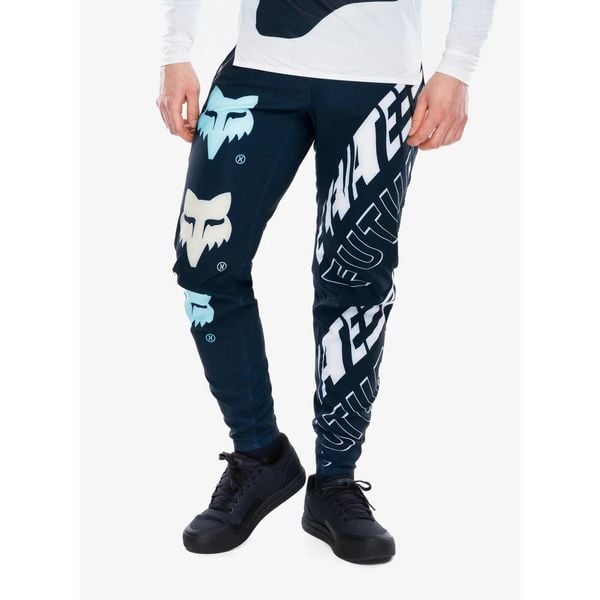 Spodnie rowerowe męskie Fox Flexair Pant Elevated. Niebieskie spodnie materiałowe męskie FOX, bez wzorów, sportowe. Za 503.99 zł.