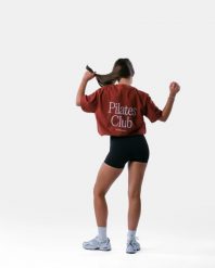 Damski oversize'owy T-shirt bawełniany – Pilates Club – ceglasty. Brązowe t-shirty damskie AESTHETICWOLF, m, bez wzorów, z bawełny, bez kołnierzyka. Za 159.99 zł.