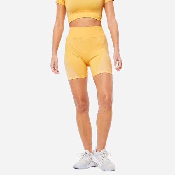 Spodenki fitness damskie Domyos krótkie. Żółte spodenki sportowe damskie DOMYOS, l, z materiału, na fitness i siłownię. Za 59.99 zł.