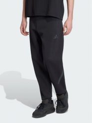 Adidas Spodnie dresowe Z.N.E. KF3808 Czarny Regular Fit. Czarne spodnie dresowe męskie Adidas, bez wzorów, z bawełny. Za 398.99 zł.