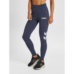 Damskie wysokie legginsy Hummel Legacy. Niebieskie legginsy sportowe damskie HUMMEL, na wiosnę, s, bez wzorów, z bawełny, z podwyższonym stanem, na fitness i siłownię. Za 106.15 zł.