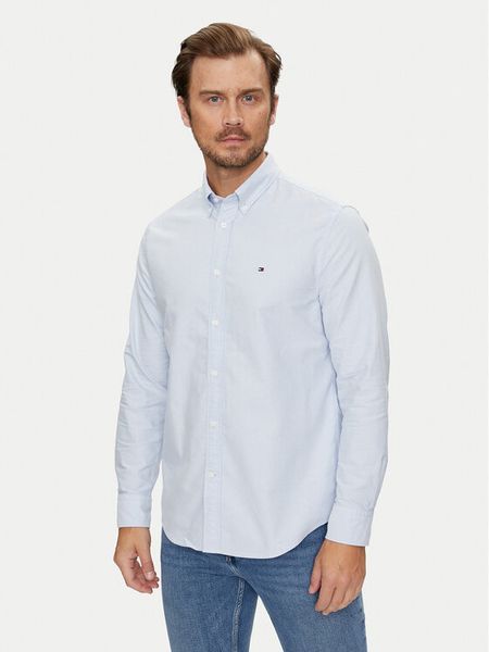 Tommy Hilfiger Koszula Solid Heritage MW0MW35774 Niebieski Regular Fit. Niebieskie koszule męskie Tommy Hilfiger, m, bez wzorów, z bawełny, bez kołnierzyka, bez ramiączek. Za 399.99 zł.