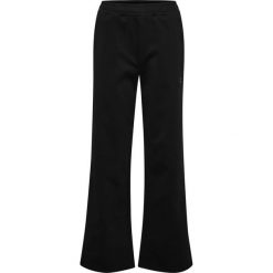 Damskie spodnie dresowe Hummel Defender. Czarne spodnie sportowe damskie HUMMEL, m, z dresówki, na fitness i siłownię. Za 249.50 zł.