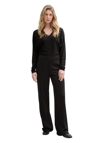 Tom Tailor Koszulka w kolorze czarnym rozmiar: S. Czarne bluzki damskie Tom Tailor, s, bez wzorów, z lyocellu, bez kołnierzyka, bez ramiączek. Za 65.07 zł.