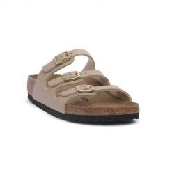 Klapki damskie Birkenstock 1029265. Brązowe klapki damskie Birkenstock, bez wzorów, z materiału, bez obcasa. Za 408.15 zł.
