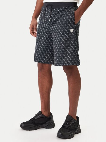 Guess Szorty sportowe Z4YD03 K7122 Czarny Regular Fit. Czarne szorty męskie Guess, z aplikacjami, z bawełny, sportowe. Za 213.99 zł.