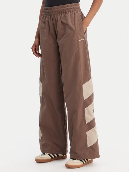 Adidas Spodnie dresowe Blocked Washed KD8790 Brązowy Loose Fit. Brązowe spodnie dresowe damskie Adidas, l, bez wzorów, z dresówki. Za 349.99 zł.