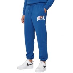 Mężczyzna>bluza Męskie Nike. Niebieskie bluzy bez kaptura męskie Nike, bez wzorów, sportowe, bez kołnierzyka, bez ramiączek. Za 286.99 zł.