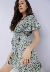 Niebieska Sukienka Asteriope. Niebieskie sukienki damskie Born2be, m, z aplikacjami, eleganckie, bez kołnierzyka, bez ramiączek, mini, kopertowe. W wyprzedaży za 95.99 zł.