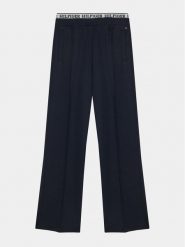 Tommy Hilfiger Spodnie materiałowe Monotype KG0KG07747 D Granatowy Regular Fit. Niebieskie spodnie dziewczęce Tommy Hilfiger, z materiału. Za 219.99 zł.